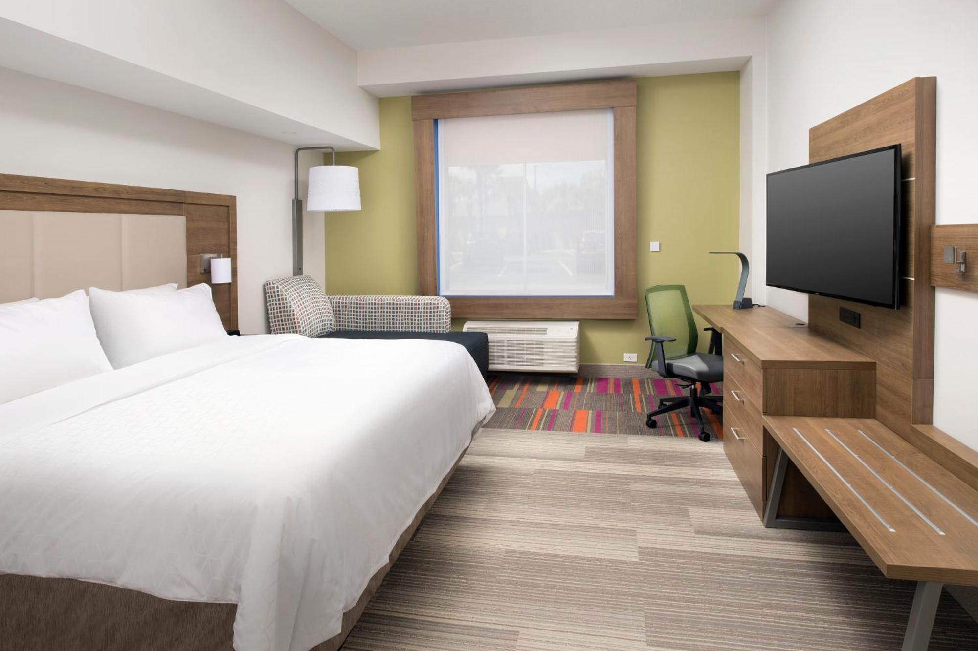 Habitación con cama extragrande y ducha a ras de suelo - adaptada para personas con discapacidad auditiva